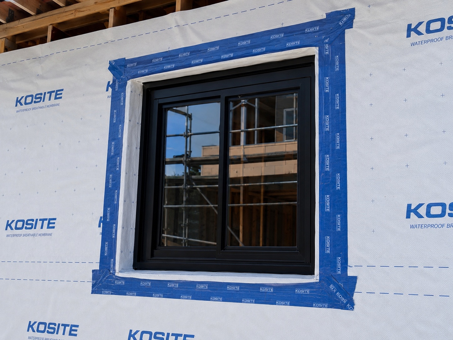 KOSITE waterproof breathable membrane and flashing tape detail around an exterior wall window opening